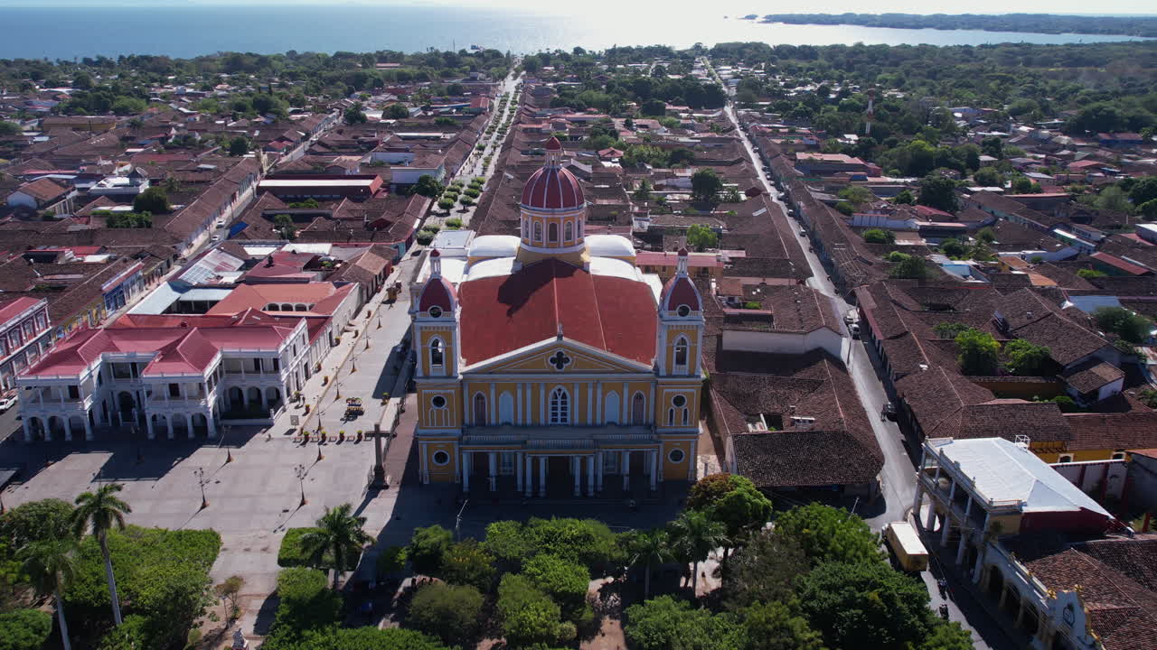 Granada, Nicaragua. Drone Shot of Central Cathedral and Park, Revealing Lake Nicaragua Coast