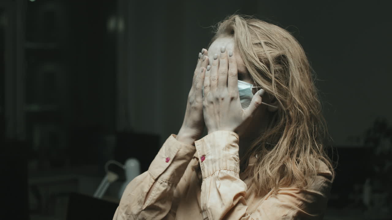 Zombie Woman Putting on Face Mask