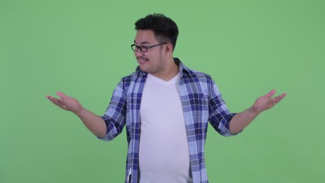 young handsome overweight asian hipster man