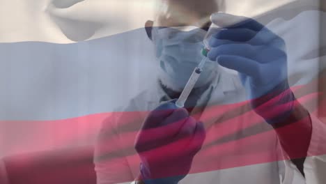 Animation-Der-Flagge-Russlands,-Die-über-Einem-Arzt-Weht,-Der-Eine-Gesichtsmaske-Trägt-Und-Einen-Impfstoff-In-Der-Hand-Hält