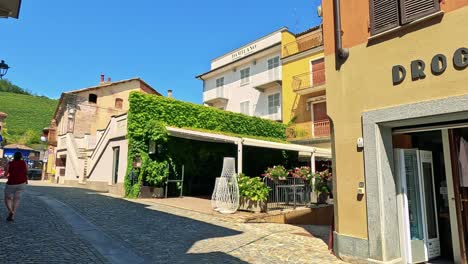 exploring a picturesque street in barolo, italy