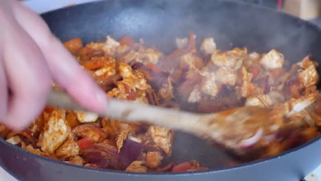 close up on hot, steaming kitchen pan