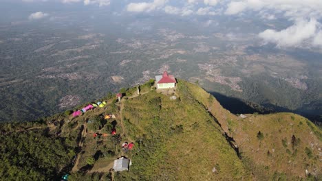 an aerial view of the top of mount andong shows a building which is a tomb of a figure