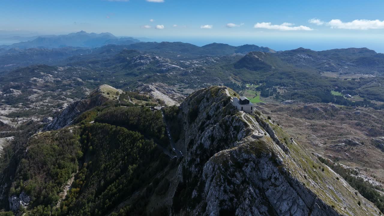 Hilltop Mausoleum of Njegos At Lovcen Mountain In Montenegro. - aerial shot
