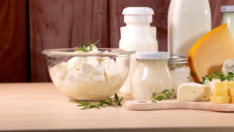 various dairy items displayed on a wooden surface