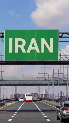 highway sign to iran with airplane in the sky