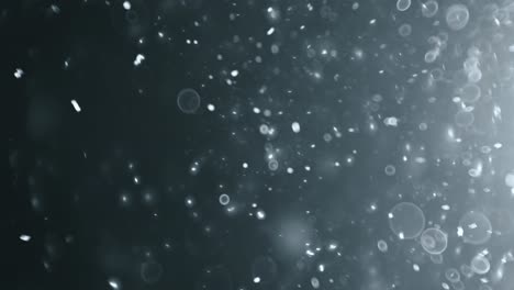 bokeh de partículas abstractas flotantes sobre fondo oscuro