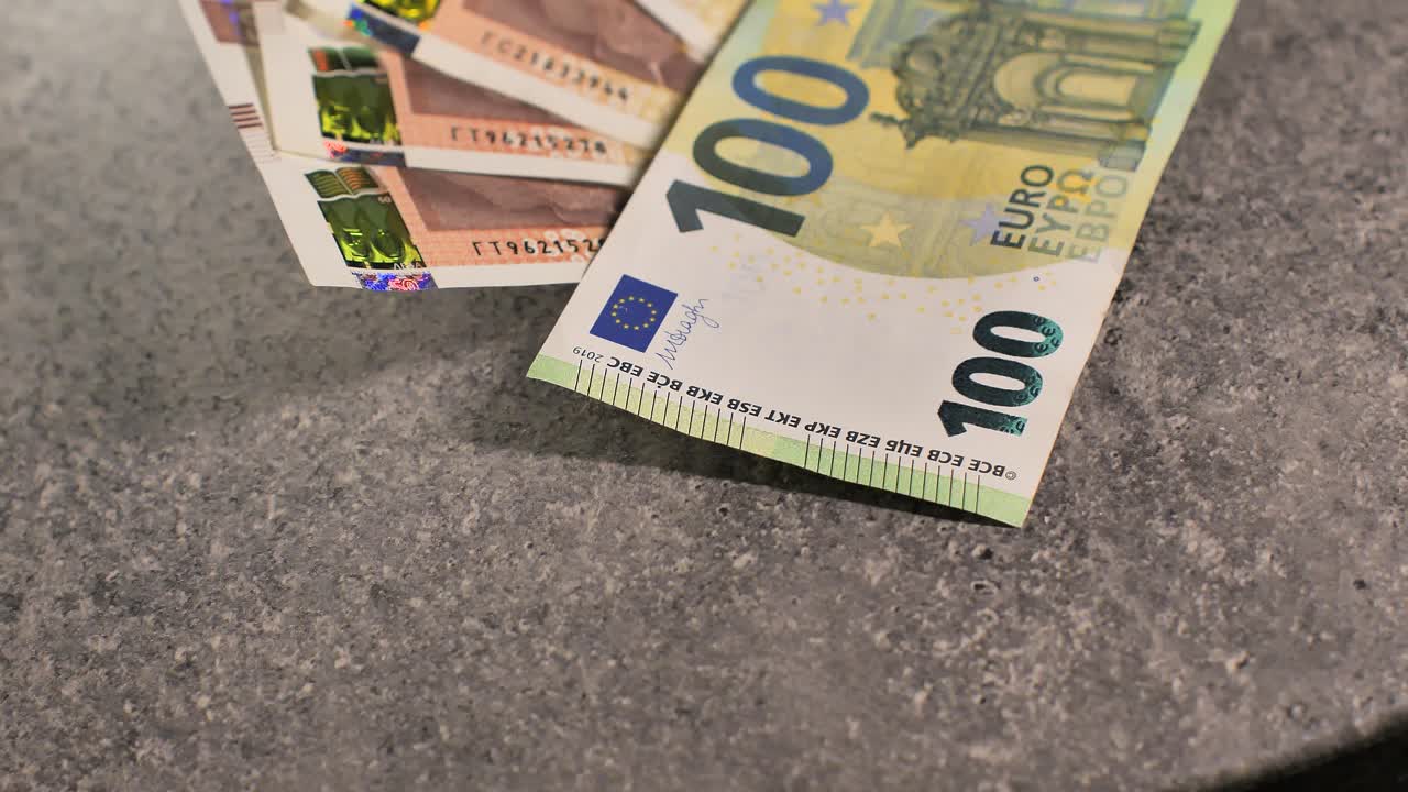 Bulgaria change currency, Bulgaria Lev to Euro. Money exchange. Paper banknotes on table. Concept, economy, competition, crisis, banking and finance. BGN,BGL. Scene A. Tilt up camera