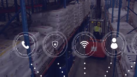 animation of data processing and icons over caucasian man working in warehouse