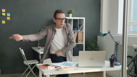 man dancing in office