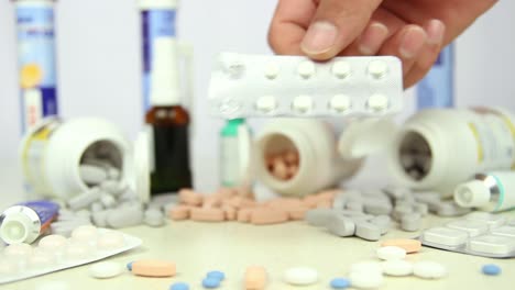young male patient swallowing a pill 2