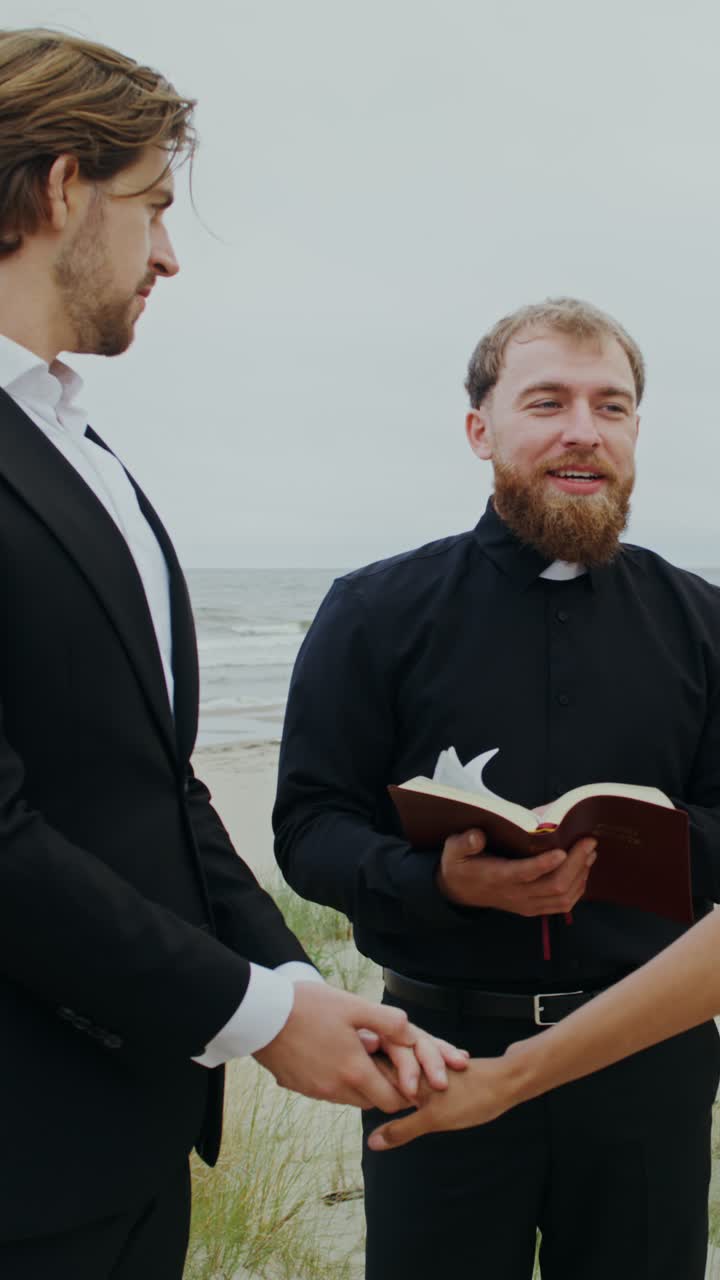 Beach Wedding Ceremony with Priest Officiating