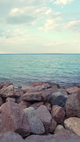 immerse yourself in the beauty of lake balaton from siofok, in vertical format! this clip captures the essence of lakeside life from a unique perspective. mobile-optimized content.
