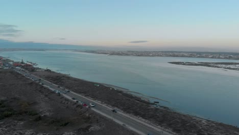 Aerial-view-during-sunrise-of-a-natural-reserve-and-it´s-river