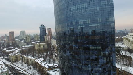 mirrored facade business skyscraper in city. aerial view glass business building