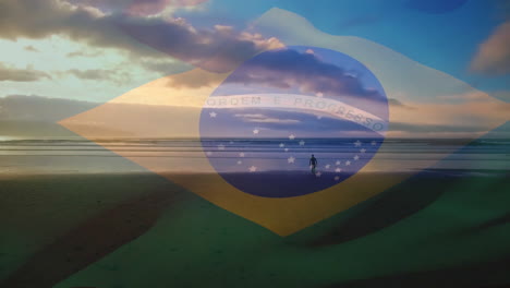 digital composition of waving brazil flag against man walking on the beach