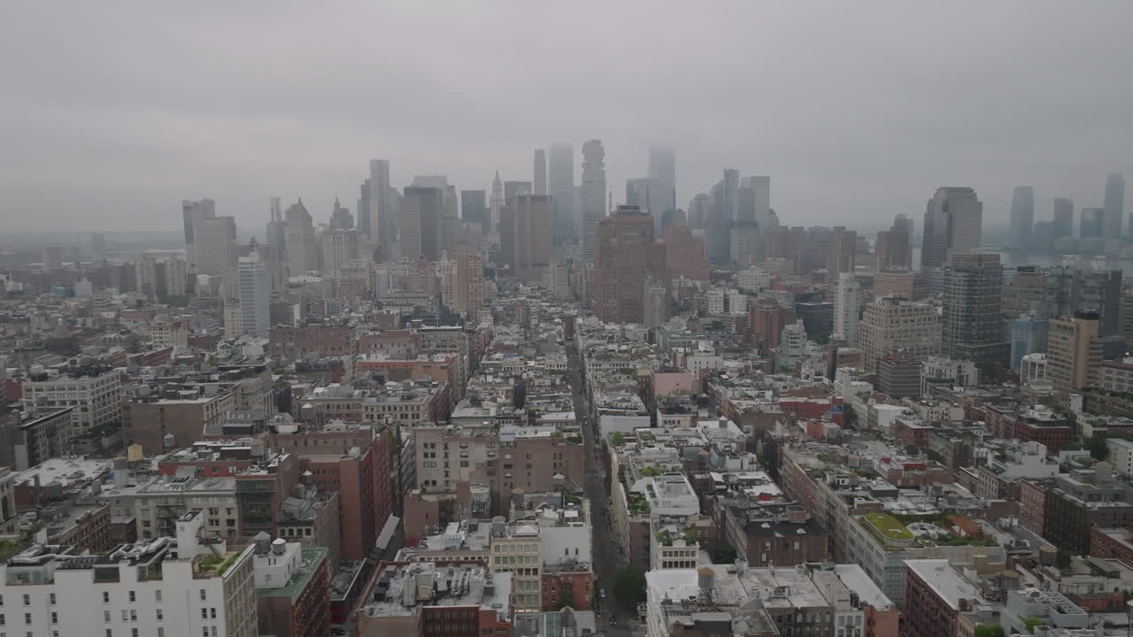 Aerial view of Lower Manhattan on an overcast morning. Shot in New York City