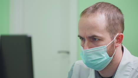 doctor working on computer