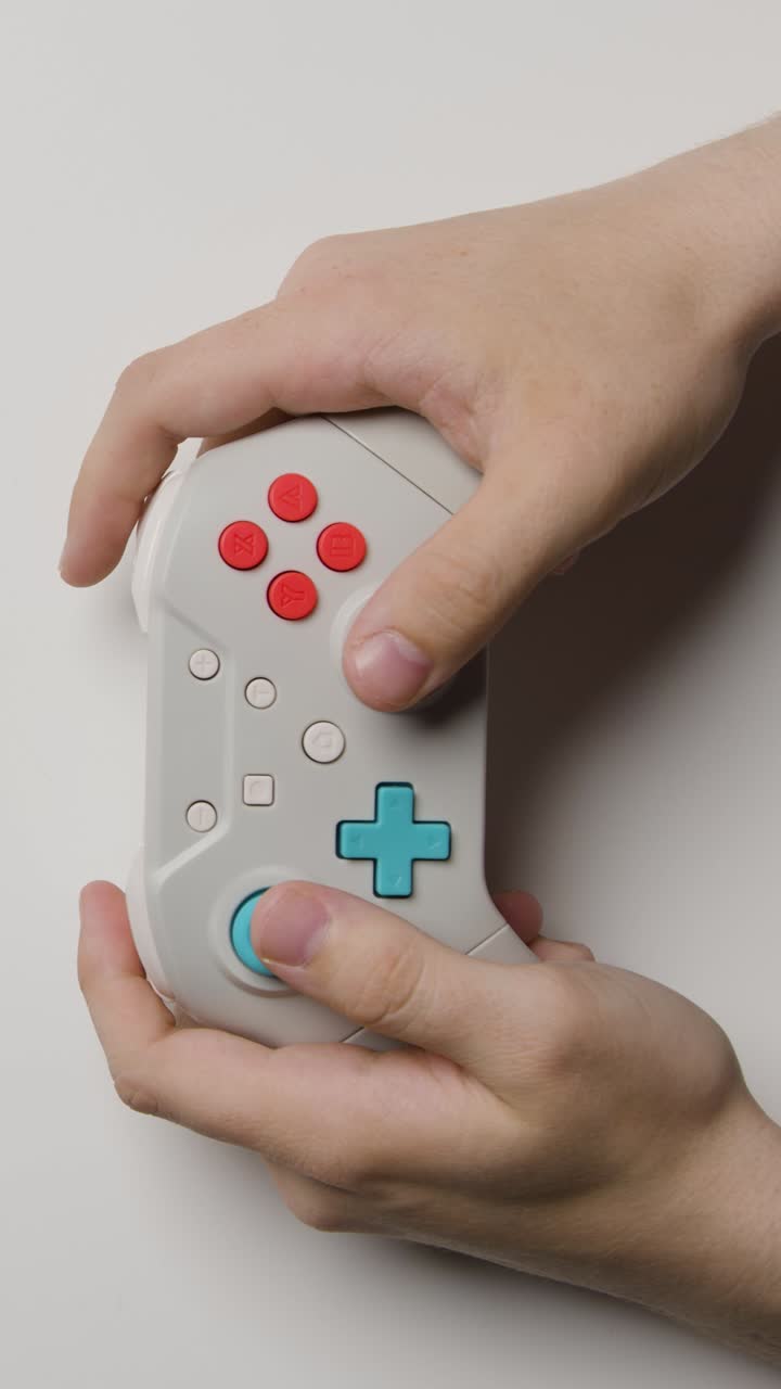 Vertical Video Overhead Studio Hands Using Playing Video Game Controller 2