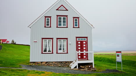 traditional icelandic house with grass on the roof