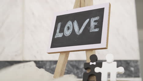 board writes the word love