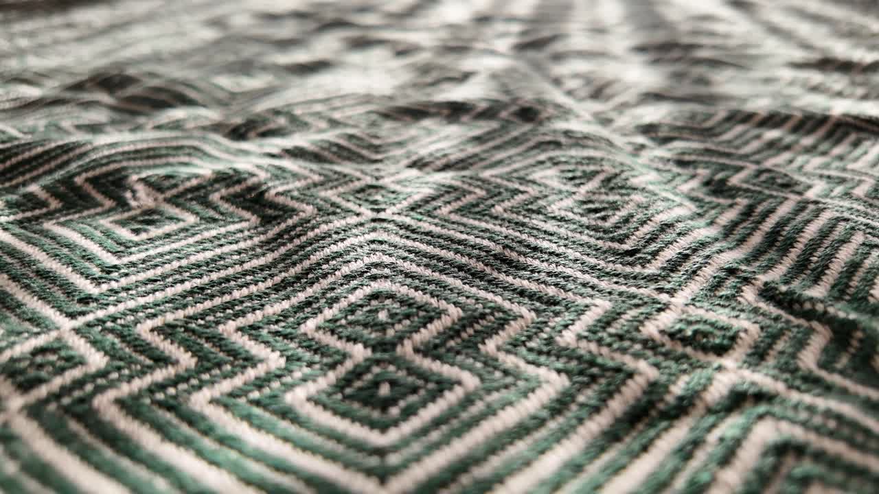 Close-up of a green and white patterned fabric