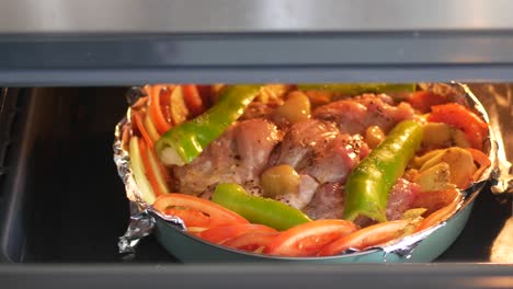roasted chicken and vegetables in oven