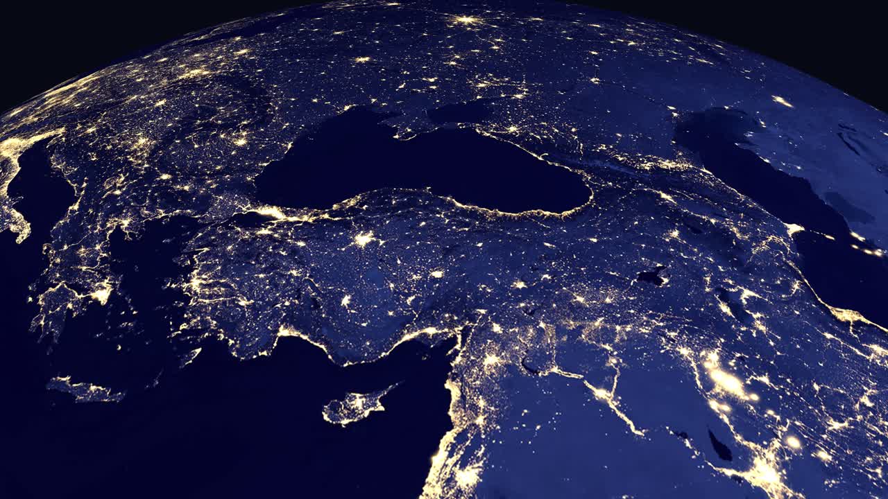 Animazione digitale zooma dallo spazio profondo a una vista notturna luminosa di Ankara, Turchia.