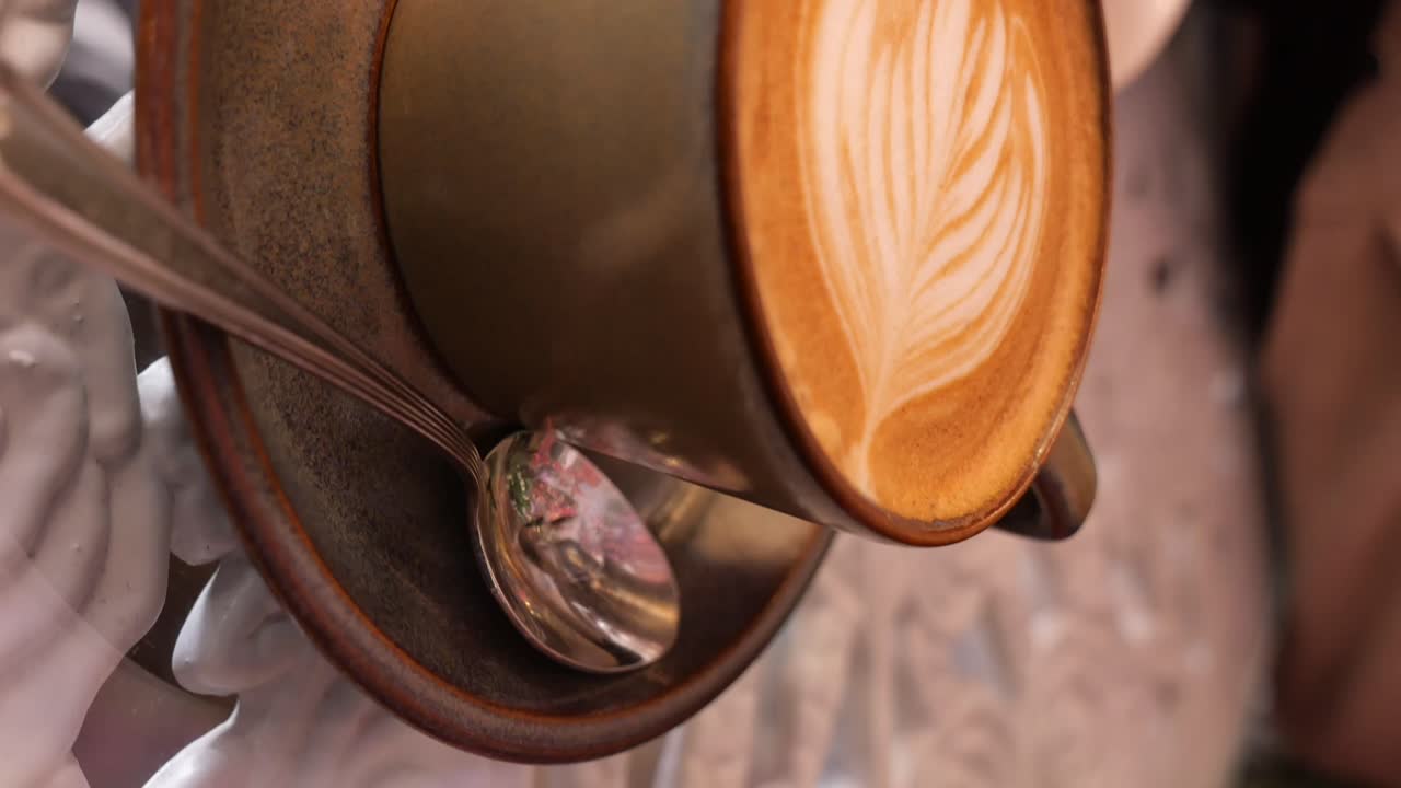 Close-up of Latte Art in Coffee Cup