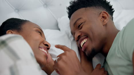 Happy,-love-and-black-couple-relaxing-in-bed