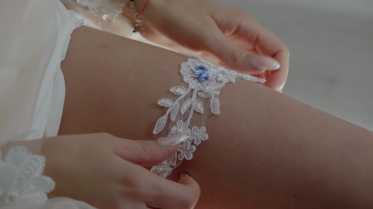 Bride’s Morning – Adjusting Garter with Blue Detail