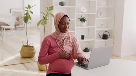 pregnant woman working from home