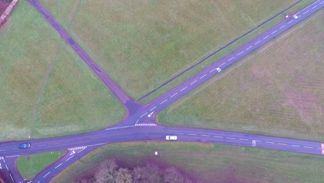 an overhead shot over a small english country village on a cold winter day