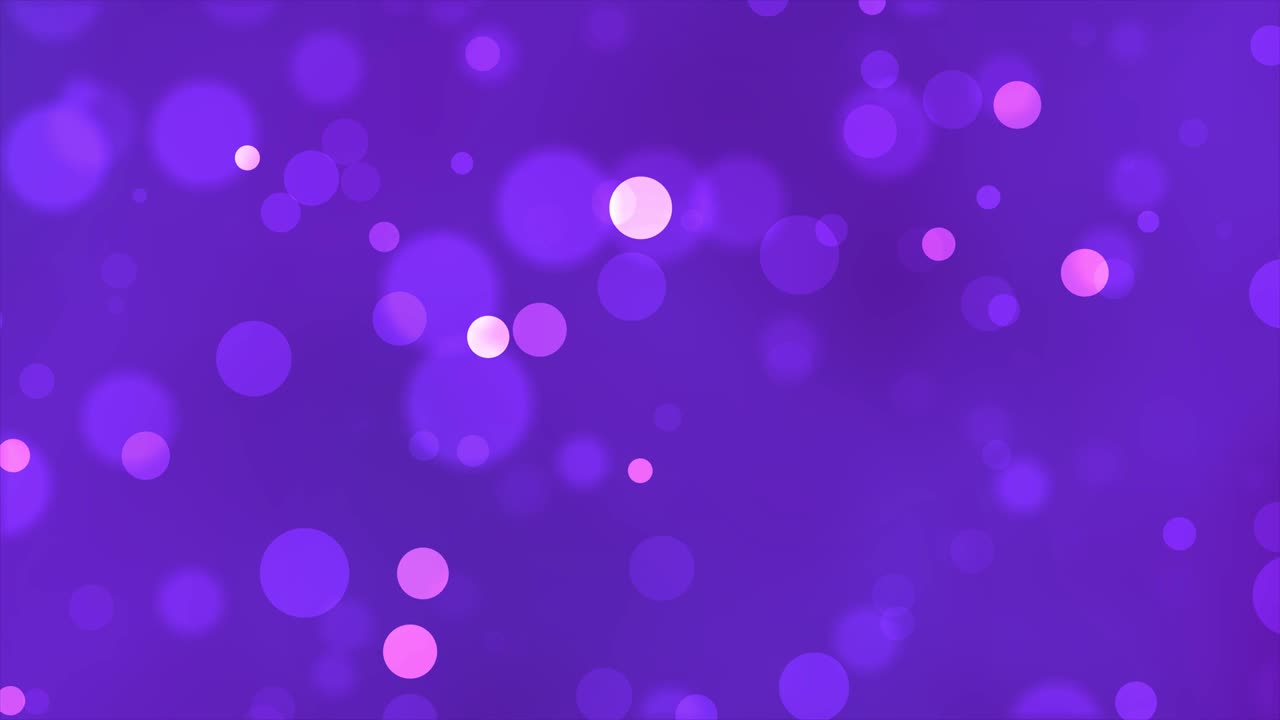 el fondo de partículas de brillo borrosas de colores que caen