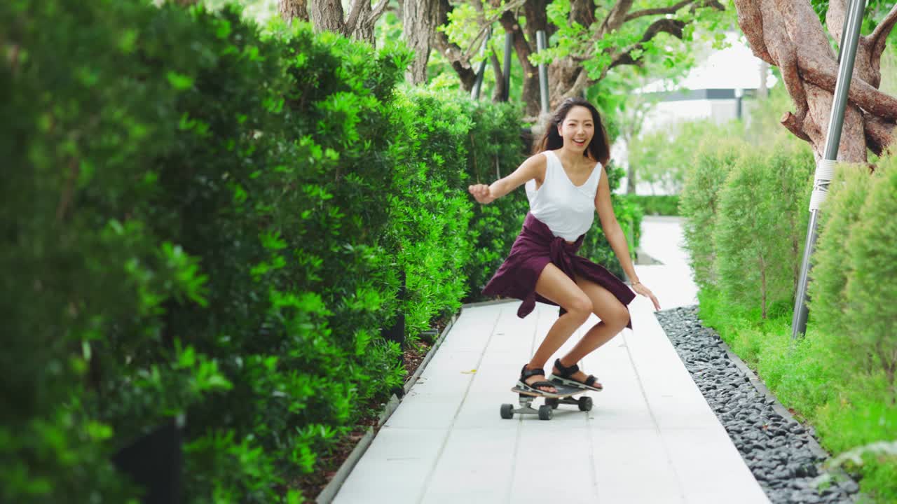 Teenagers skateboarding on rooftop terrace