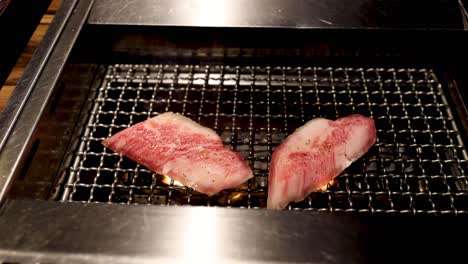 steak pieces cooking on a grill over time