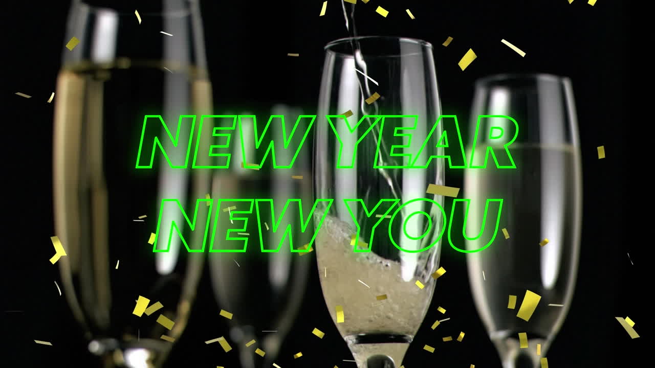 Animation of happy new year text over glasses of champagne and confetti