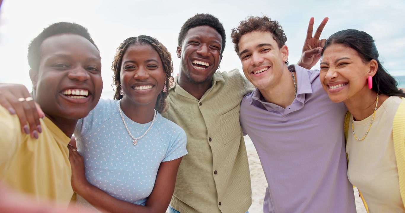Group of Diverse Friends Taking a Selfie on the Beach