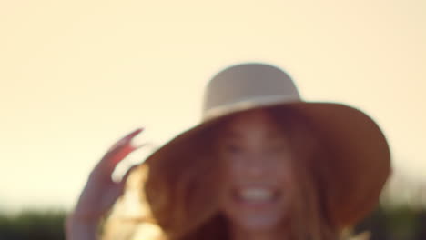 Happy-woman-face-laughing-in-sunshine-outdoor.-Beautiful-lady-in-sky-background