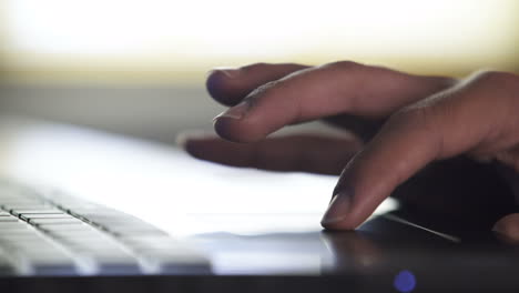 hand using a laptop