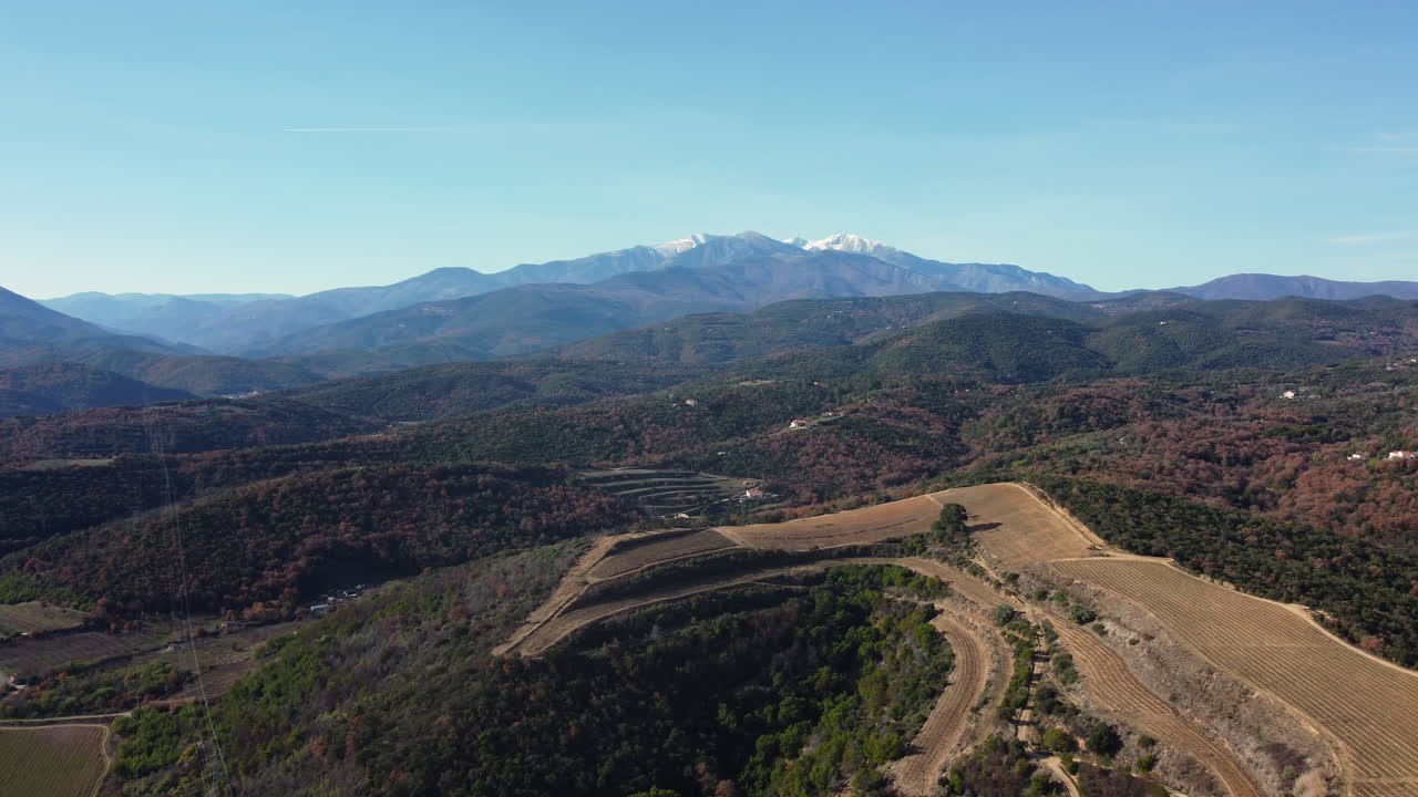 Aerial View of Mountainous Landscape with Vineyards