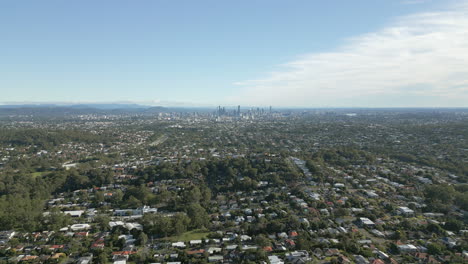 suburban queensland neighborhoods from above with brisbane city in the distance australia