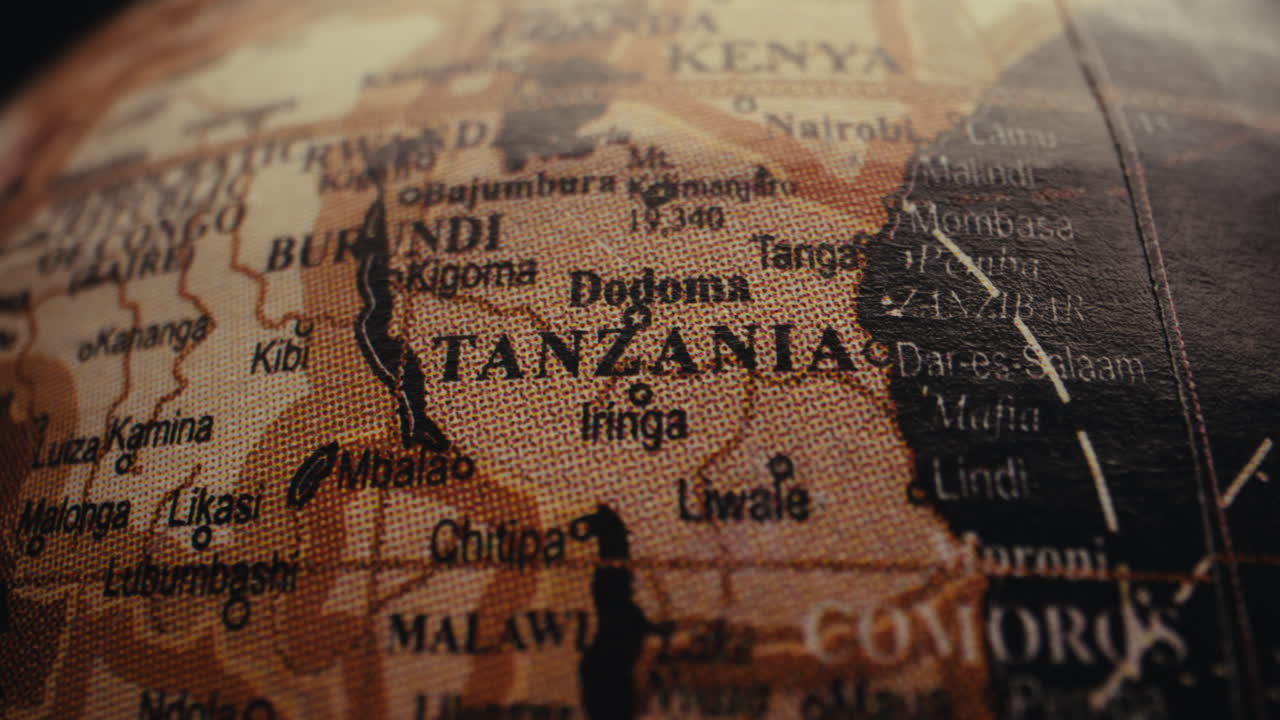 Close-up of a world map, highlighting Tanzania and surrounding countries