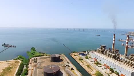 Aerial-shot-of-a-processing-oil-plant-next-to-a-lake-in-Venezuela