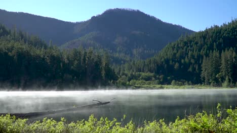 High-altitude-lake-steaming-on-a-cold-morning