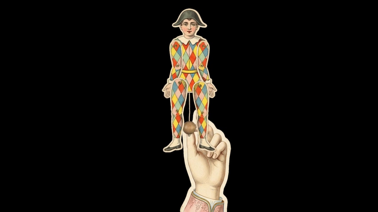 Burattino Arlecchino di carta vintage con braccia e gambe mobili