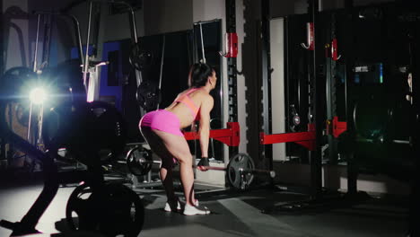 Motivation-And-Commitment-To-The-Sport-Athletic-Woman-Training-In-Agym-In-The-Spotlight-Female-Bodyb