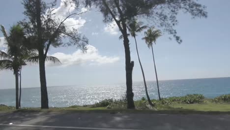 wide shot of the road with the background of a beautiful sea on the horizon, beautiful sunny day, uhd, view gopro, 60fps