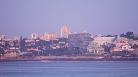 sun reflecting on the ocean at cascais bay