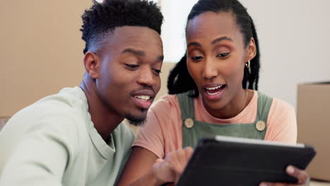 Tablet,-real-estate-and-a-black-couple-planning